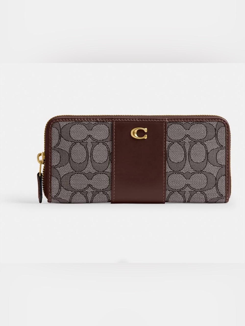 Essential Slim Accordion Zip Wallet
In Signature Jacquard
Brass/Oak Maple